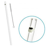 Clear straw with cleaning brush on a white background