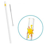 Clear straw with yellow silicone sleeve and cleaning brush on a white background